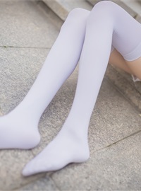 Rabbit plays with painted white stockings over the knee(50)